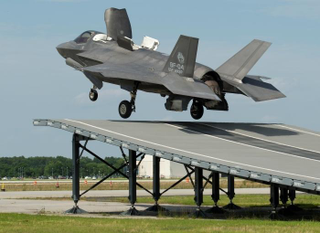 Illustration for article titled F-35B Makes Its First Leap Off The Ski Jump
